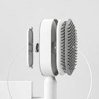 Ergonomic Grip Hairbrush With Quick Clean Base System