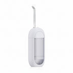 White dental water flosser with 'TOOTHY' branding on a white background