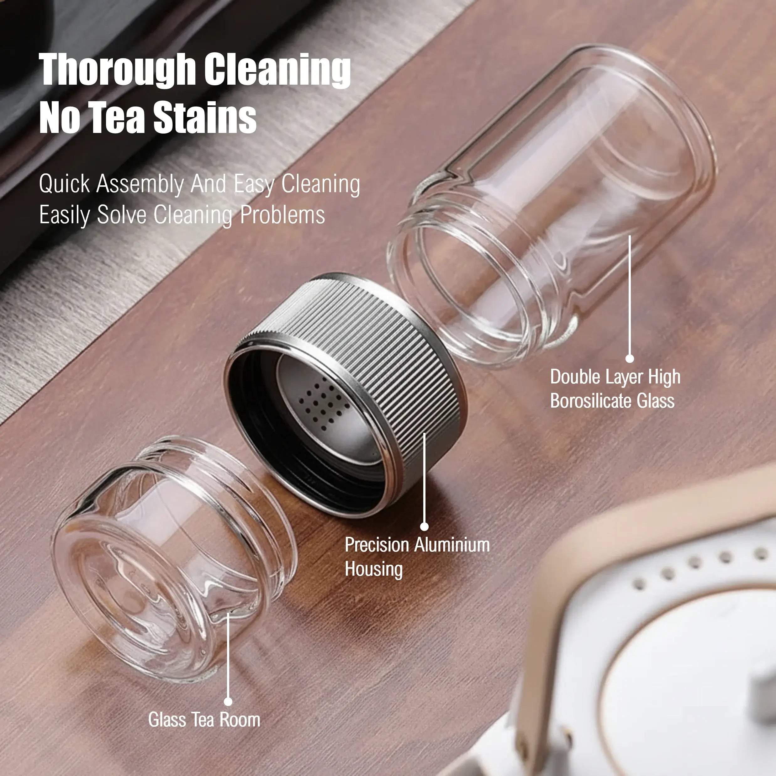 Tea infuser with labeled parts on a wooden surface