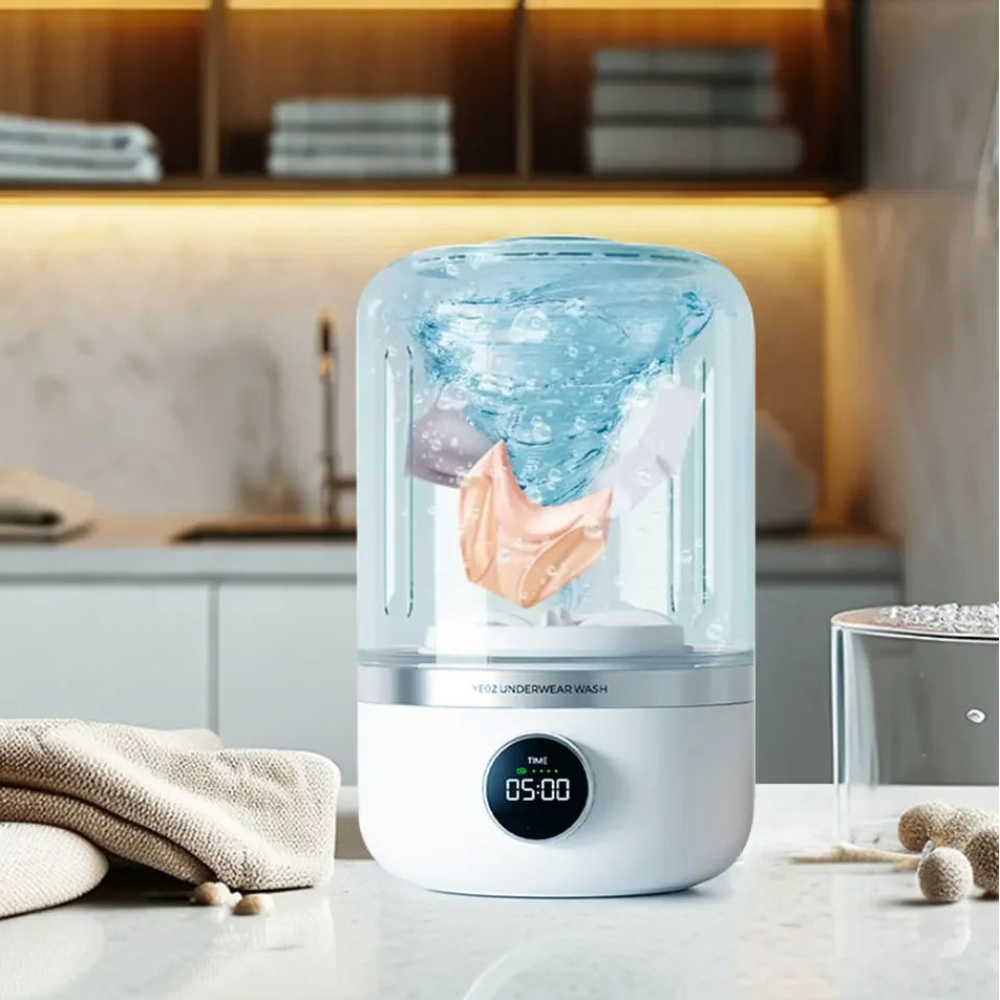 Underwear washing machine on a kitchen counter with a digital display