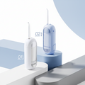 Two dental water flossers, one white and one blue, on a modern design background.