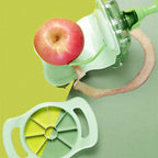 Green apple peeler with a red apple on a green background